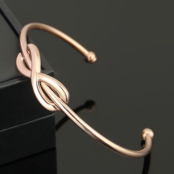 

Titanium steel jewelry wholesale and foreign trade letters of eight opening 18 k gold bracelet lady figure 8 foreign trade opening bangle