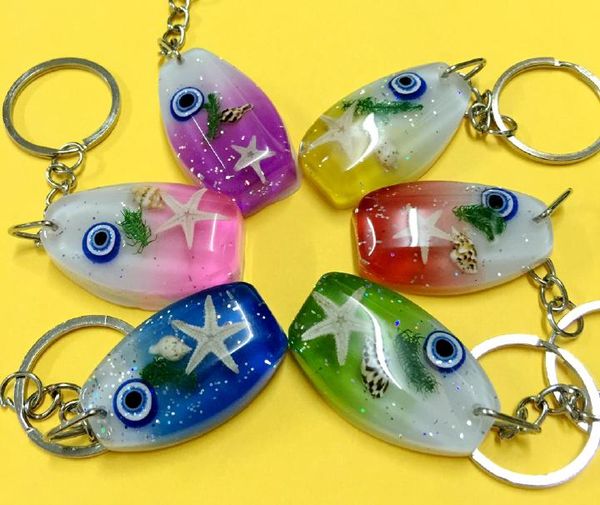 

yqtdmy 12 pcs colorful star totem mixed color charming keychain, Slivery;golden