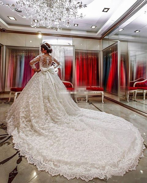 

luxury 2019 new vintage long sleeve lace wedding dresses ball gown bow sash arabic country western bridal gowns chapel train covered button, White