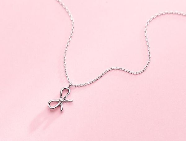 

cute authentic 100% real. 925 sterling silver fine jewelry open hollow bowknot pendant necklace gtlx1753