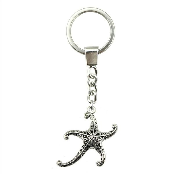 

6 pieces key chain women key rings for car keychains with charms 3d hollow starfish 45x43mm, Slivery;golden