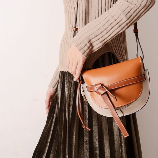 

New guangzhou gate bag contra t bow addle bag leather fa hion women 039 bag