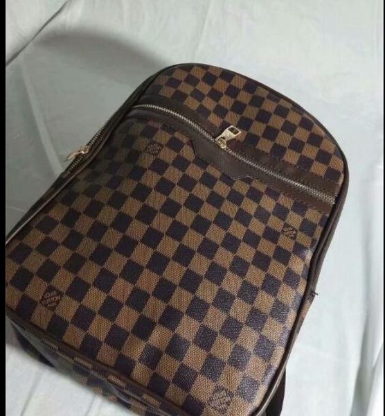 

Высокое качество Европа мода Марка Женщины сумки горячий панк стиль мужчины рюкзак дизайнер рюкзак ПУ Леди сумки