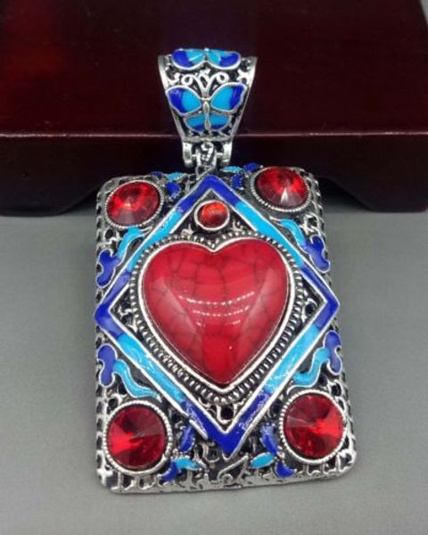 

exquisite tibetan silver inlaid red zircon handwork pendant