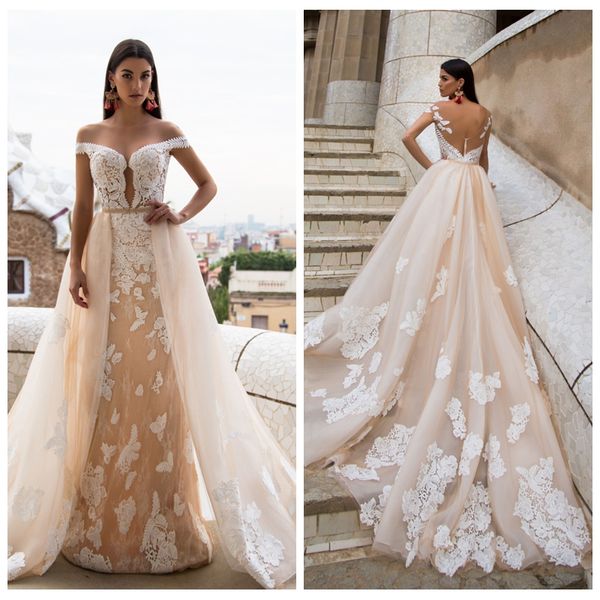 

Milla nova heer neck cap leeve champagne wedding dre e with applique lace detachable kirt bridal gown