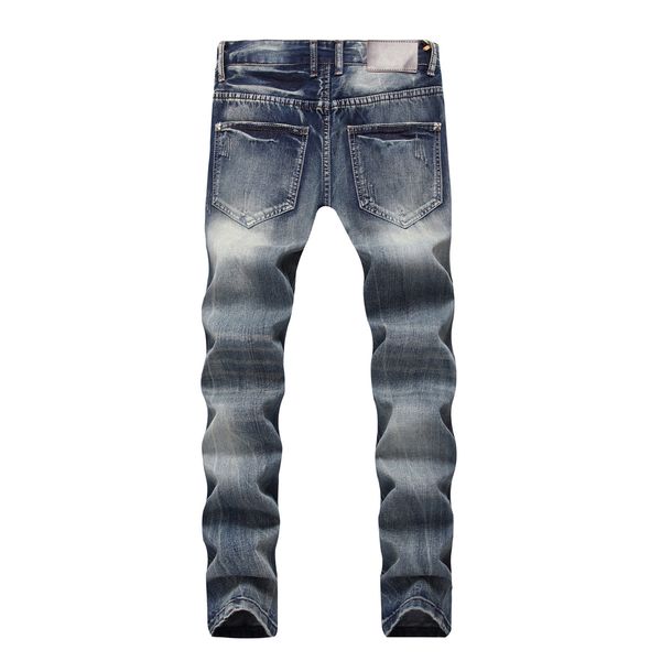 

2018 spring and autumn men's wear designer jeans, jeans with deep blue zipper button pants, and men tearing jeans