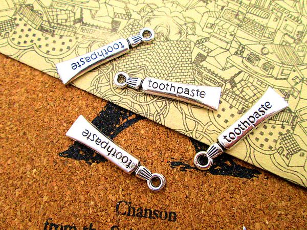 

75pcs--toothpaste charms, antique tibetan silver tone toothpaste charms pendants 28x7mm, Bronze;silver