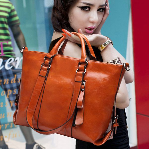 

europe and the united states female bag 2018 new leisure messenger hand joy oil wax leather middle-aged big bag simple package