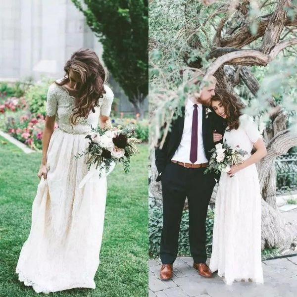 

скромный стиль страны boho свадебное платье полный кружева короткие рукава длина пола пляж чешские свадебные платья на заказ кристаллы талии, White
