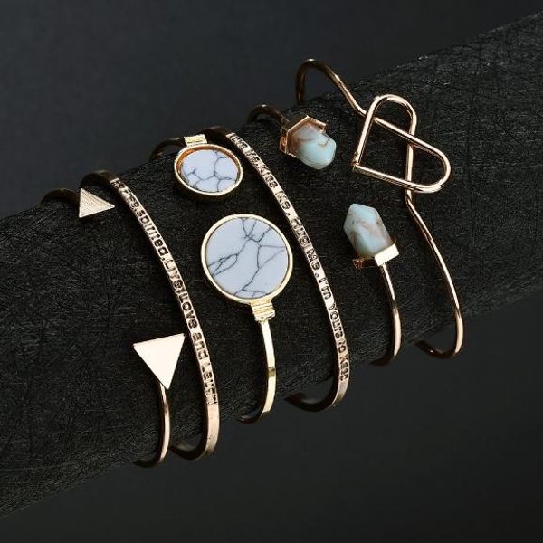 

six piece style is accessorised with a marble motif retro geometric round marble bracelet with letters and love openings, Black