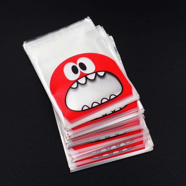 

100pcs cute big teech mouth monster plastic bag wedding birthday cookie candy gift packaging bags opp self adhesive party