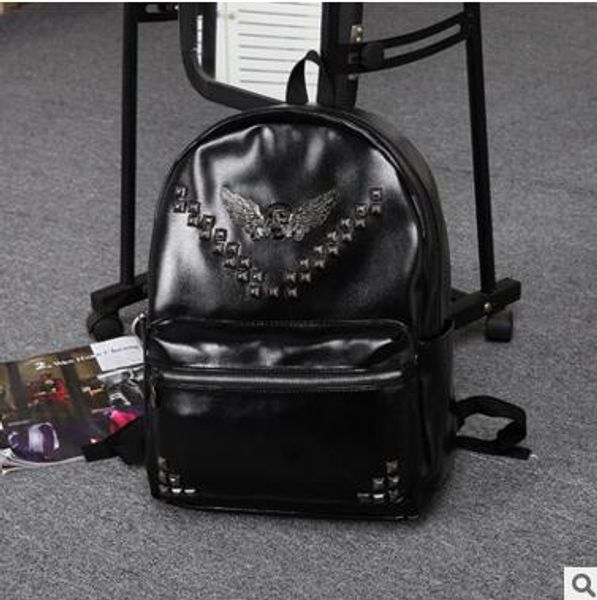 

factory wholesale brand mens bag backpack british couple skull rivet leather backpack, trend of wind capacity korean leather student bag