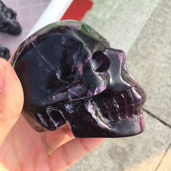 

natural purple fluorite carved skull ornament, Black