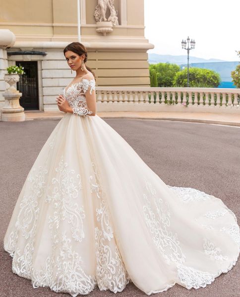 2021 Abiti da sposa vintage a maniche lunghe A Line Abiti da sposa Scollo trasparente Illusion Appliques in pizzo Corte dei treni Abiti da sposa Abito da sposa arabo