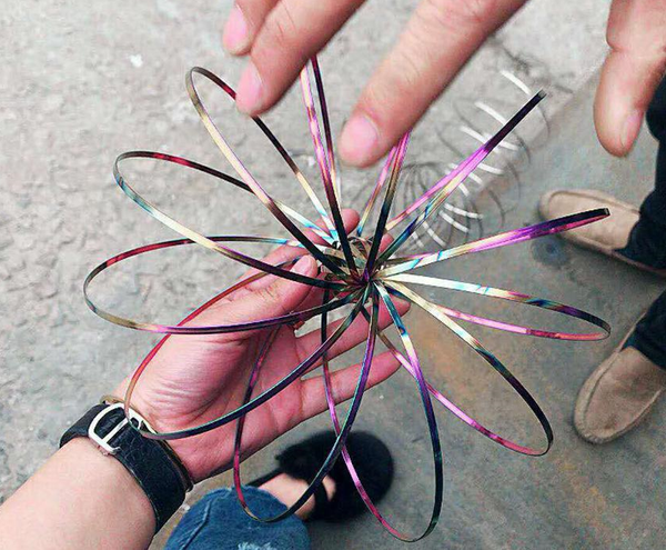 

Metal toroflux rainbow colorful flow ring toy holographic by while moving create a ring flow kinetic toy ooa4717