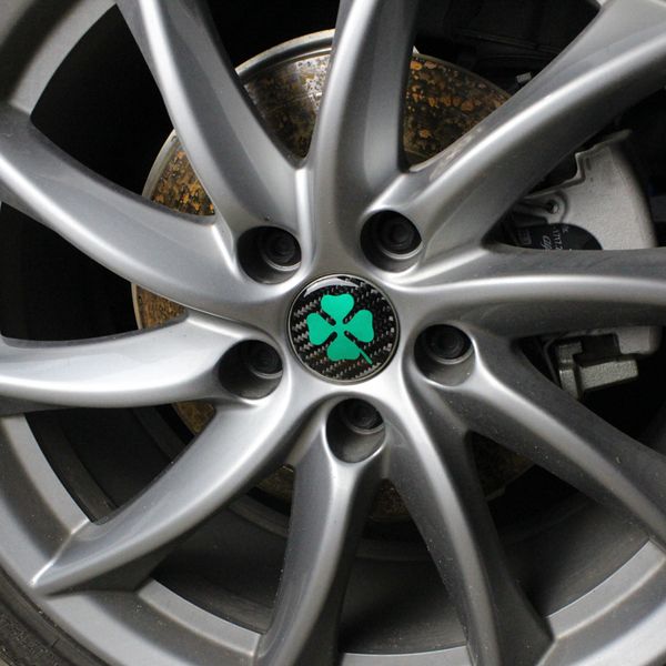 

4pcs 56mm car stickers for alfa romeo giulia gt quatrefoil green badge decal fit car tyre wheel center hub cap sticker emblem