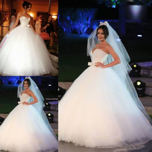 

Luxury Crystal Beaded Ball Gown Wedding Dresses Bow Sashes White Bridal Dresses Plus Size Arabic Dubai Wedding Dress