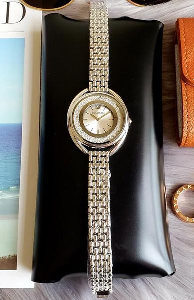 

Fa hion brand warov ki women gold watch cry tal dial teel ladie chain wri twatch luxury quality lei ure de igner quartz clock watche