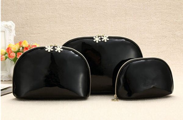 

cc women snowflake zipper elegant famous beauty cosmetic case makeup organizer bag toiletry clutch bag