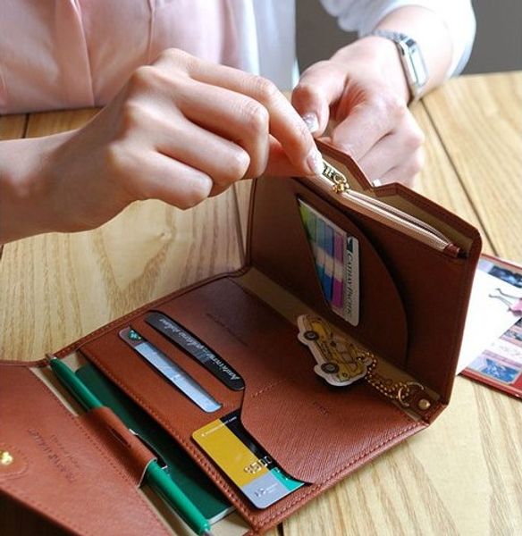 

a multi-functional wallet. thin soft leather. short. passport package. travel documents bag. zero purse. card bag. men and women's purs, Red;black