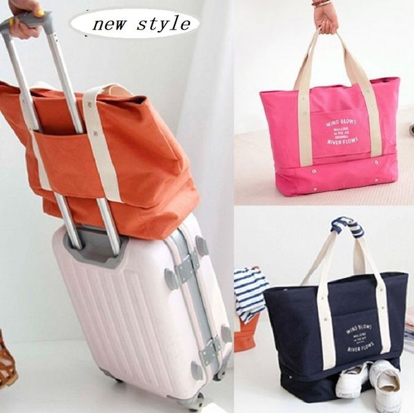 

4 colours new fashion canvas travel pouch waterproof travel handbags women luggage bag folding bags ing