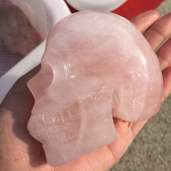 

natural pink crystal fluorite carved skull ornament, Black