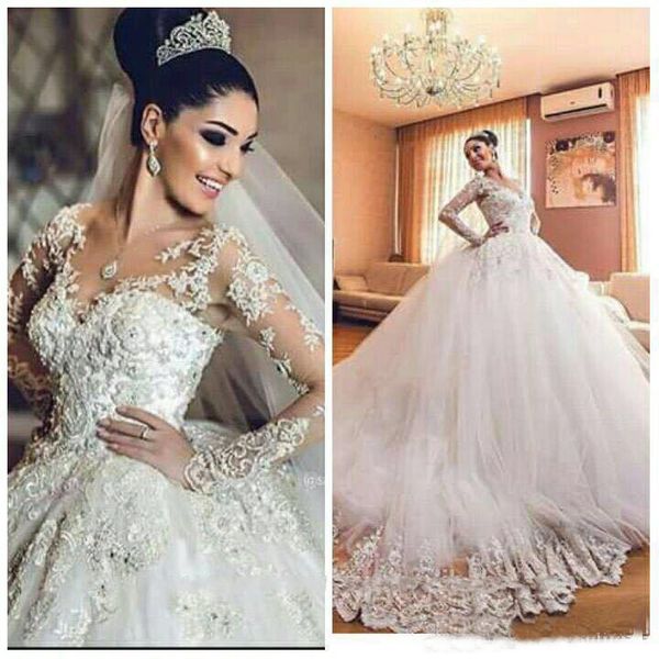 Abito da sposa arabo africano Collo trasparente 3D Appliques floreali Maniche lunghe Abiti da sposa Abito da sposa in tulle di lusso dell'Arabia Saudita