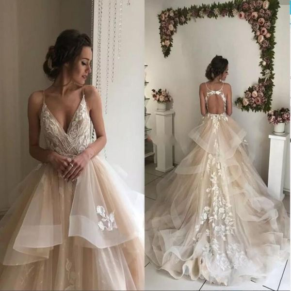 

Ball Gown Wedding Dresses Sexy Deep V Neck Spaghetti Straps Appliques Lace Tulle Tiered Backless Bridal Dresses Country Wedding Gowns Cheap