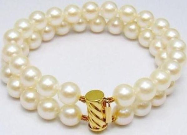 

charming 2 row 9-10mm white pearl bracelet 14k yellow gold marked 7.5-8, Black