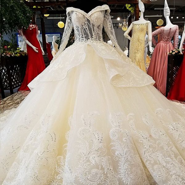 

2019 saudi arabia sweetheart neck wedding dresses long tulle sleeve overskirts ruffle lace up back exquisite pattern applique bridal gowns, White