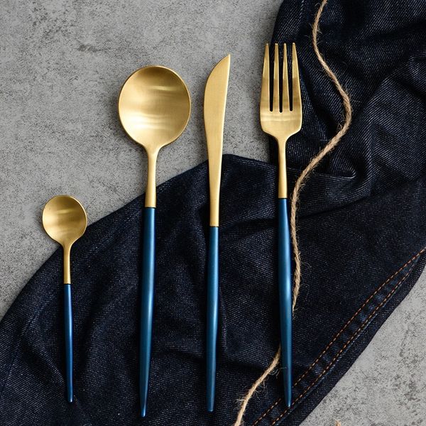 

royal gold and blue flatware, matte gold and blue cutlery, star l silver and blue tableware