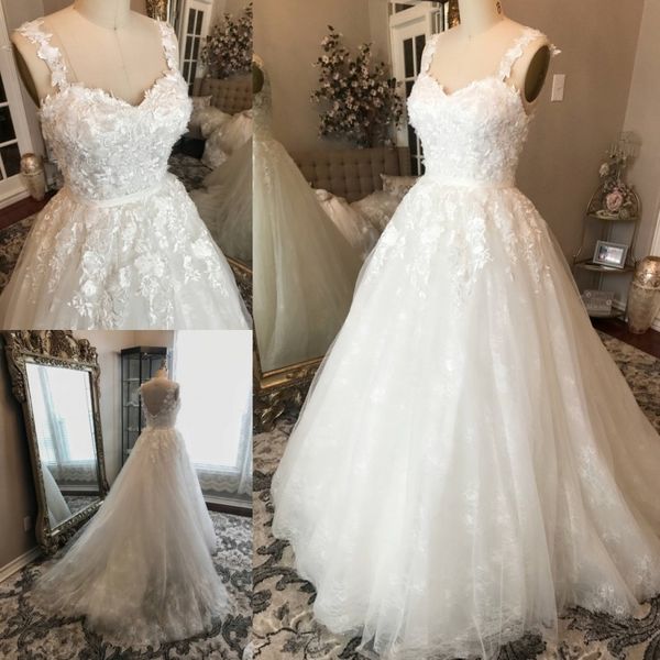 Immagine d Abiti con applicazioni floreali reali Senza spalline con scollo a cuore in pizzo Dubai Abiti da sposa arabi Sweep Train Abito da sposa Applique Brial Weing