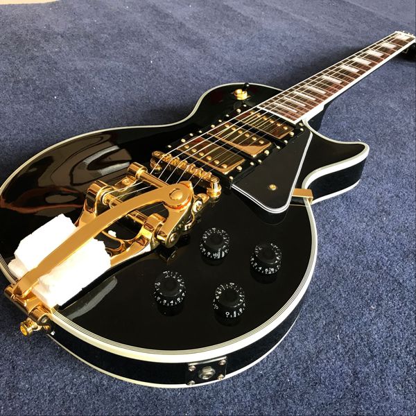 

Cu tom hop 1960 electric guitar black beauty jazz guitar