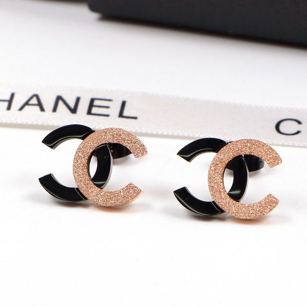 

Per onality titanium teel tud for women fa hion party lady earring letter couple earring jewelry for night club