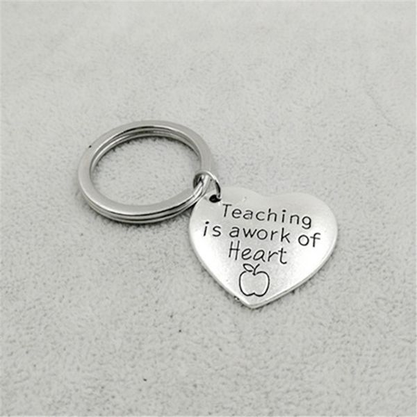 

1 pcs trendy silver color alloy teaching is a work of heart keychain teacher gift jewelry