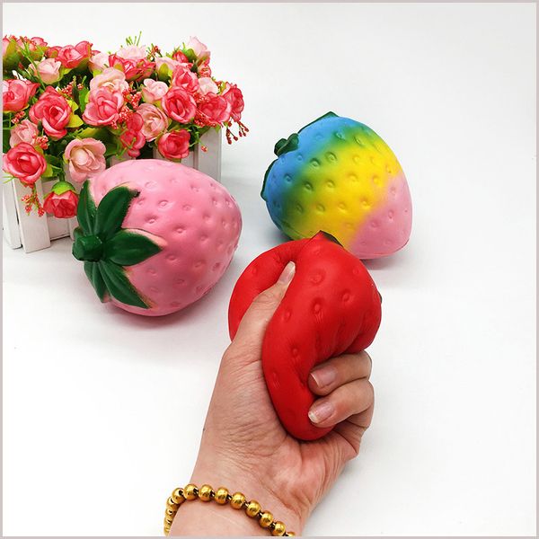 

4 color 12cm big colo al trawberry qui hy jumbo imulation fruit kawaii artificial low ri ing qui hie queeze toy bag phone mq50