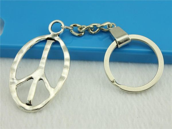 

6 pieces key chain women key rings fashion keychains for men oval peace sign 51x28mm, Slivery;golden