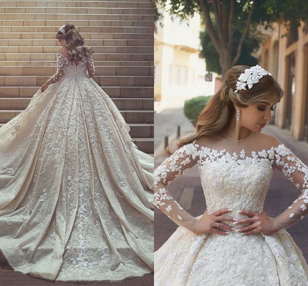 

2018 new luxury gorgeou wedding dre e long illu ion leeve heer neck ruffle applique cathedral train cry tal wedding bridal gown