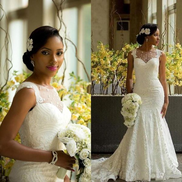 

African Style Lace Wedding Dresses 2017 Modest Sheer Neck Back Covered Buttons Bridal Gowns Plus Size Sweep Train Newest