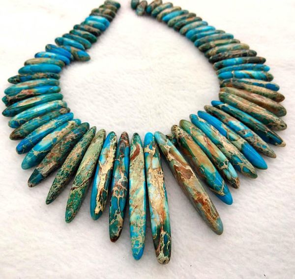 

Длинные морские отложения Imperial Jasper gemstone 20-60 мм зубы шипы указал Imperial Jasper ожерелье