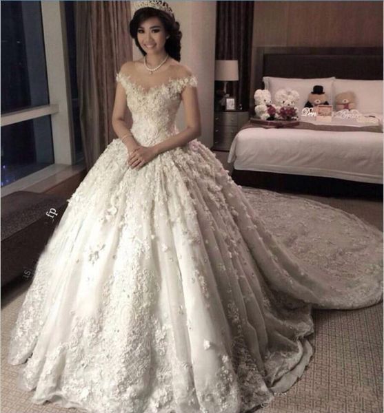 

018 New Luxury Arabic Ball Gown Wedding Dresses Cap Sleeves Lace Appliques 3D Floral Flowers Puffy Chapel Train Plus Size Bridal Gowns