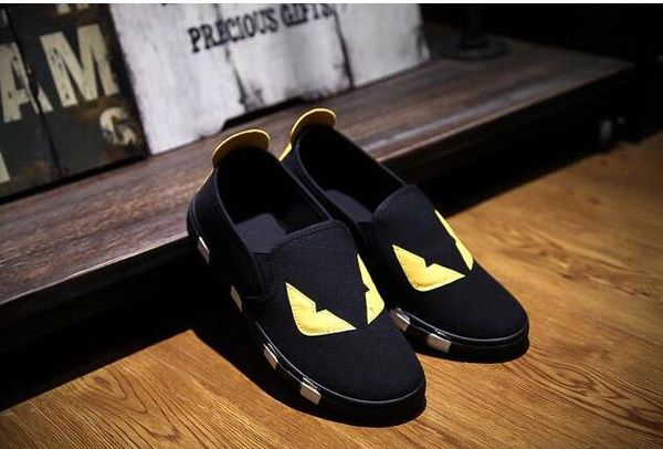 

Марка Мужчины Маленькие монстры Черные Желтые глаза Женщины Холст обувь Плоские