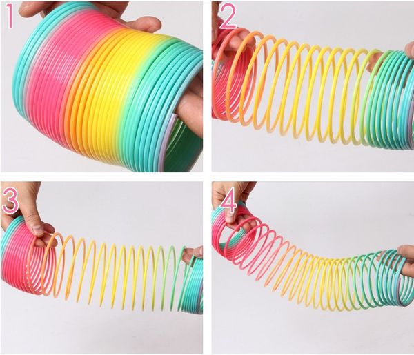 

big Rainbow circle 9cm Colorful Rainbow Plastic Magic Slinky Kids Children Classic Development Educational Toy Christmas Gifts