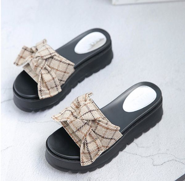 

sloping heel slipper women wear fashionable high-heeled 2018 new women's bow-knot muffin shoes with thick bottom and cool mop outside, Black
