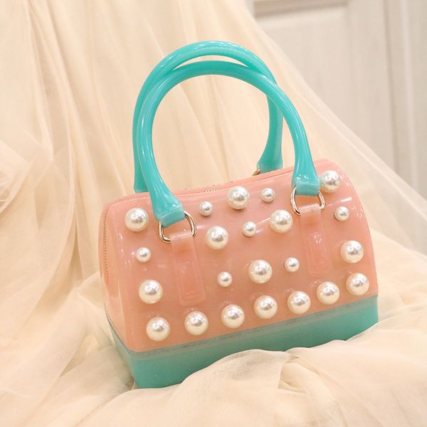 

gu yi xuan 2018 spring and summer female fashion ins with the same pearls spliced shoulder shoulder bag jelly bag