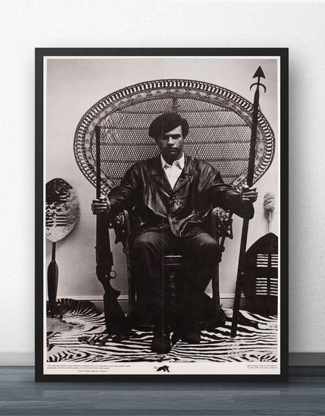 

huey newton seated in a wicker chair hq rare movie wall art wall decor silk prints art poster paintings for living room no frame