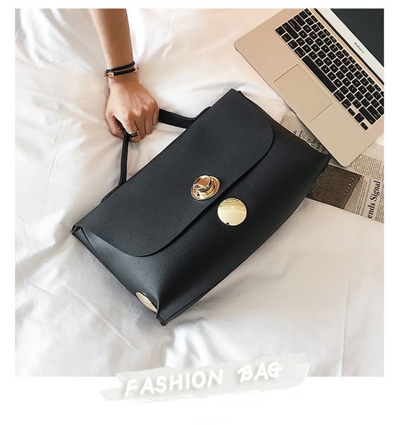 

2019 new simple handbag handbags europe and the united states fashion buckle big bag commuter boston bag