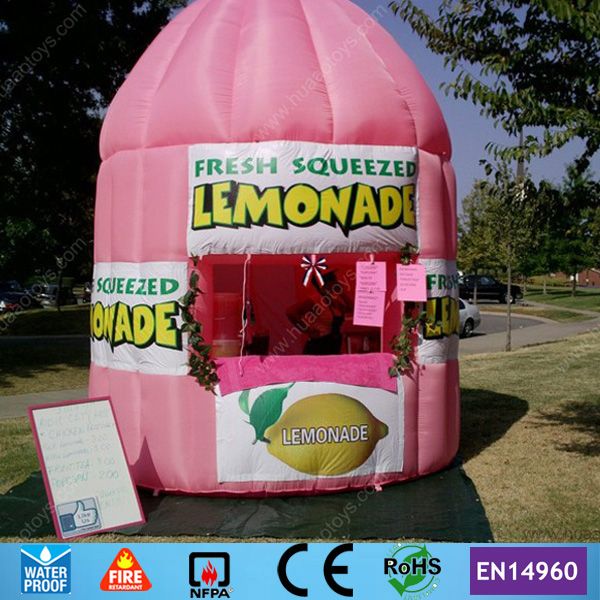 

pink inflatable lemonade booth with banners and ce blower