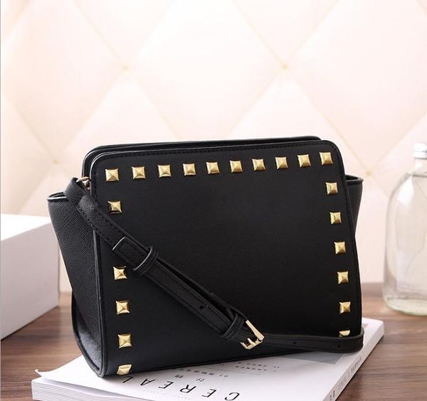 

Factory direct sale HOT classic single shoulder bag fashionable rivets smiling face pack Europe and the United States wings one shoulder as