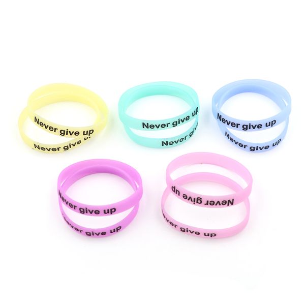

2pcs/lot glow in dark silicone rubber sport elasticity wristband cuff bracelet